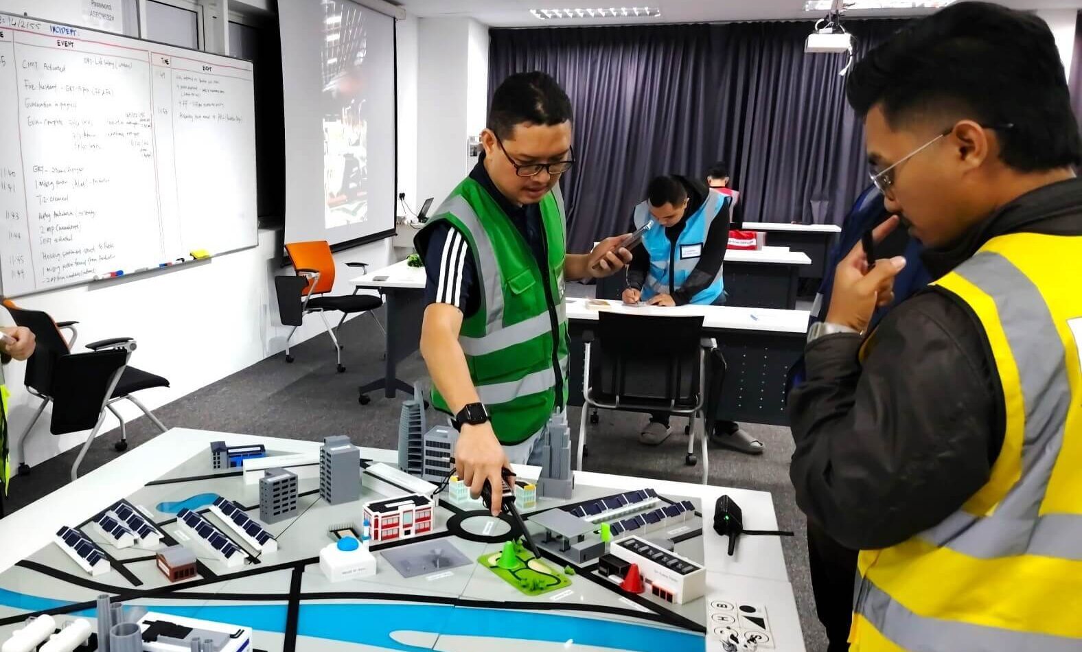Emergency response planners conducting a tabletop simulation using a crisis management model.