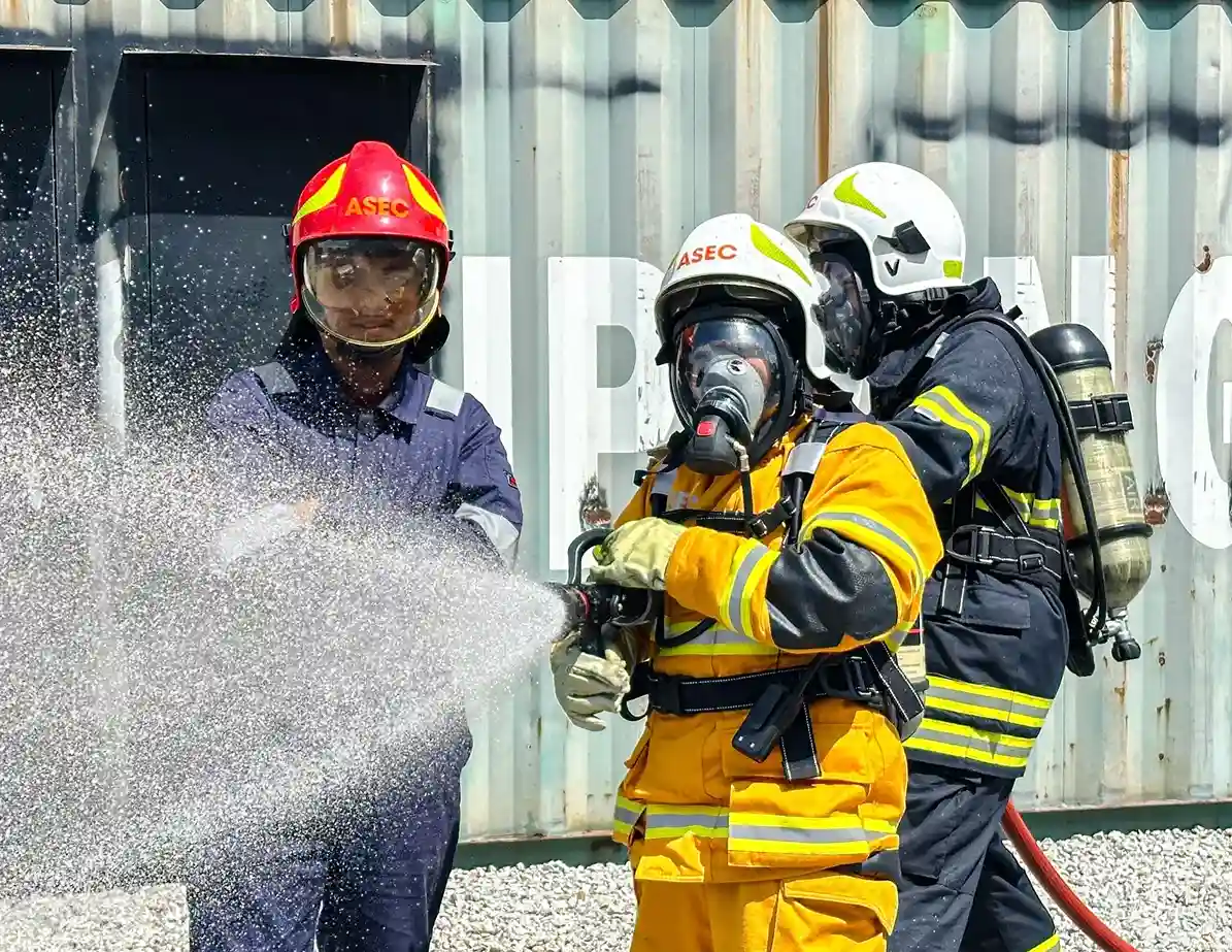 Emergency response training participants preparing for practical workplace emergency response training