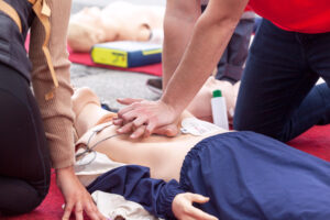 somebody performing CPR training