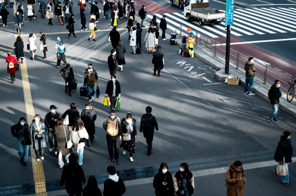 big crowds of people on the road