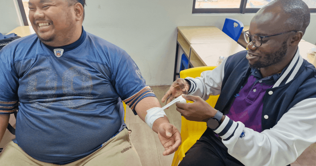 man receiving first aid